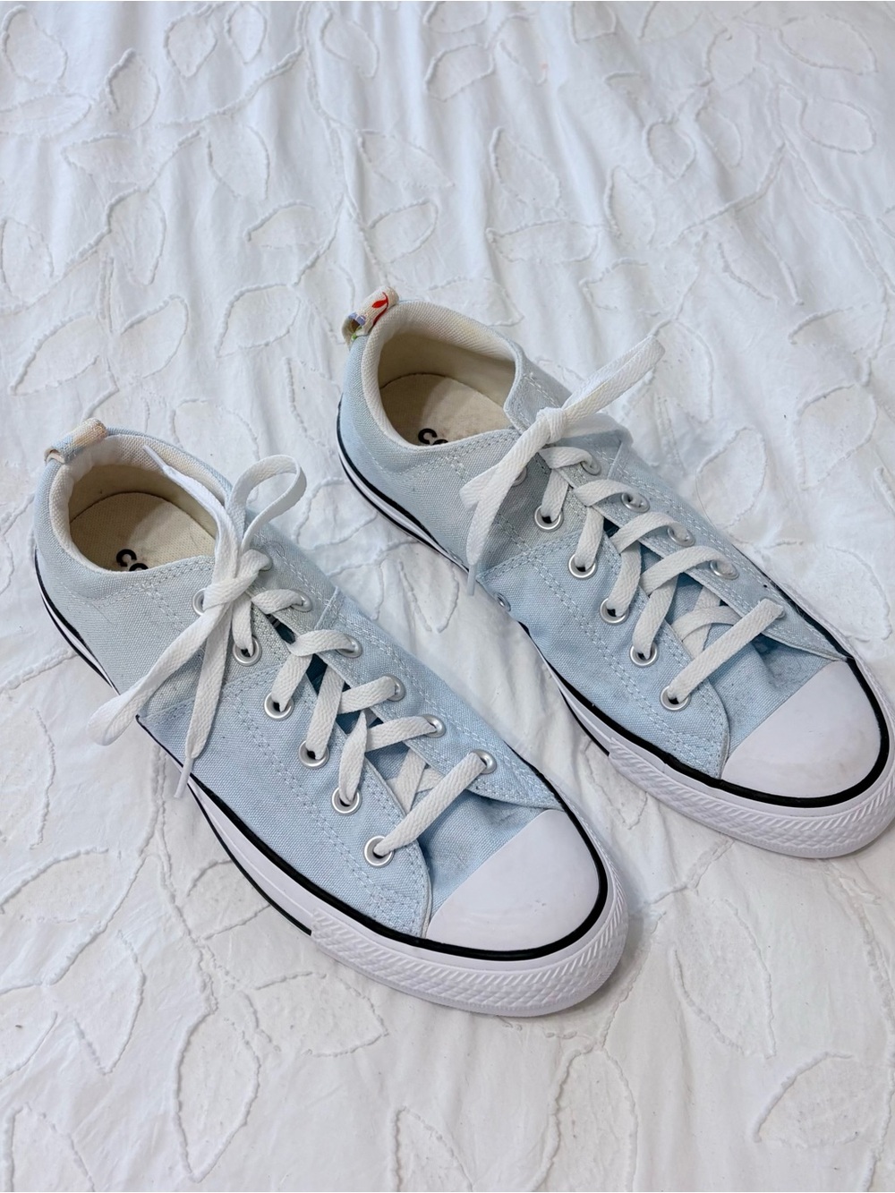 Never worn Light Blue low top converse